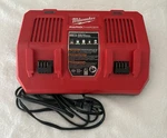 Milwaukee M18 V Simultaneous Rapid Dual Battery Charger. Fixed Price $105.00.