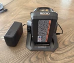 Ridgid 18V Battery/charger R84730KSBN. Fixed Price $48.00.