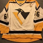 Starter Yellow And Black Hockey Jersey. Fixed Price $200.00.