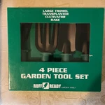 Ruff Ready 4 Piece Green Garden Tool Set With Box - Trowel, Rake, Cultivator. Fixed Price $22.40.