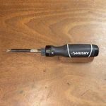 Husky 8-PIECE Ratcheting Multi-bit Screwdriver Set, Phillips/flat, Black. Fixed Price $8.00.