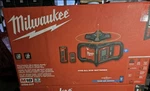 Milwaukee 3704-21T M18 18V Red Exterior Dual Slope Rotary Laser Kit W/ Receiver. Fixed Price $2299.99.